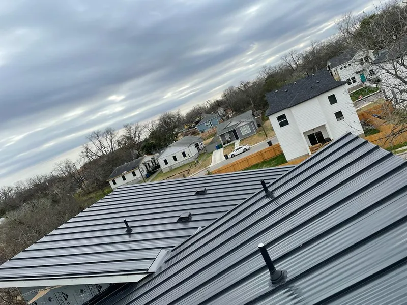 Standing seam metal roof panels with vents for Skylight Repair in Parkville